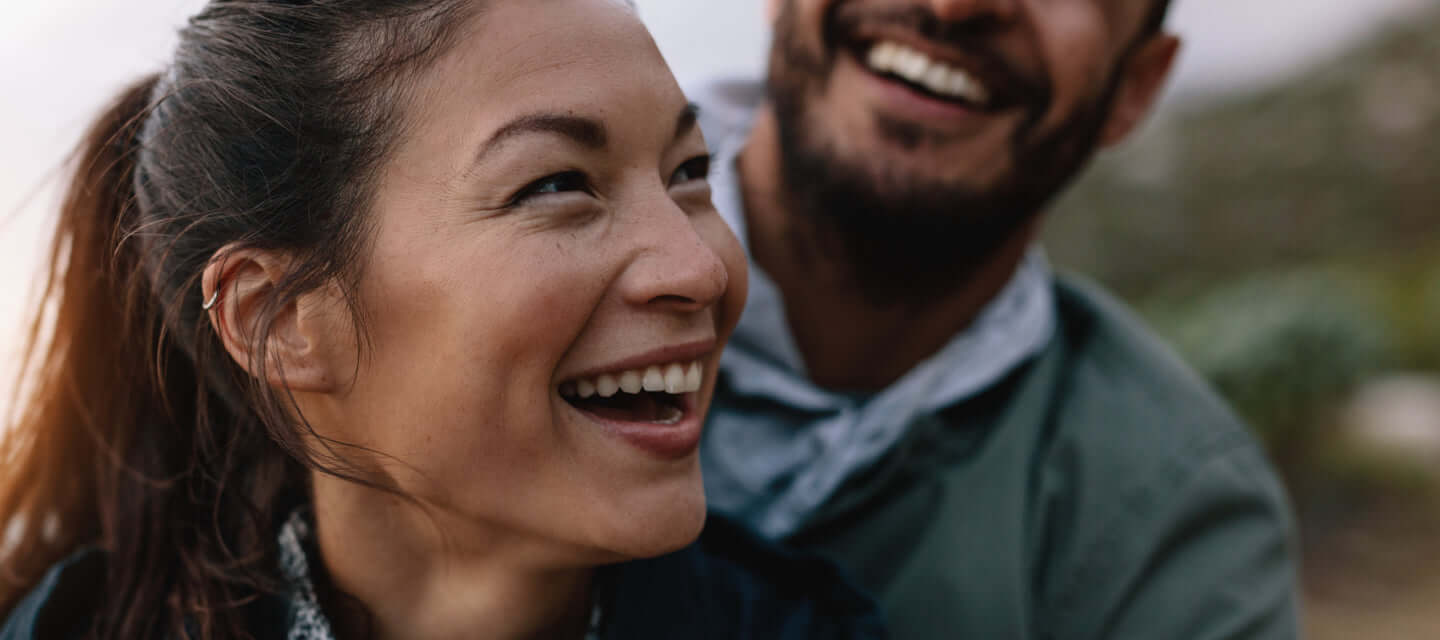 Happy, healthy couple who use CBD for relief, calm and sleep.
