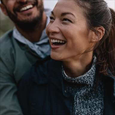 Happy, healthy couple who use CBD for relief, calm and better sleep.