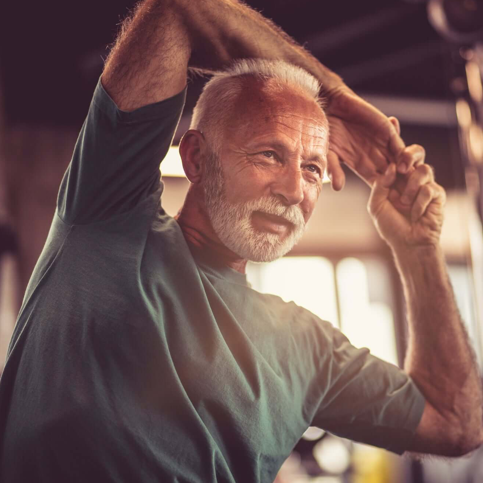 Older gentleman stretching with the benefits of Function Botanicals Full Spectrum CBD products.